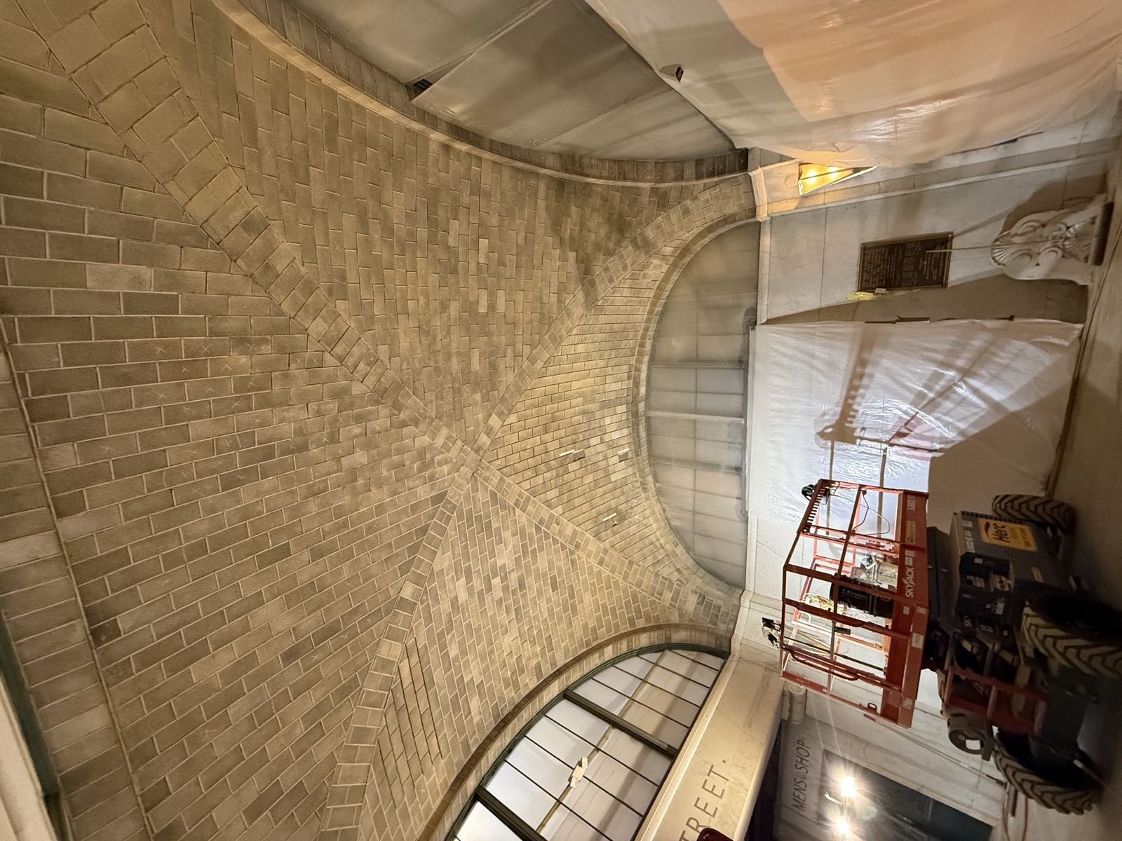 Entry lobby Guastavino vault at Buffalo Central Terminal under restoration, with a lift positioned beneath the Akoustolith tile ceiling