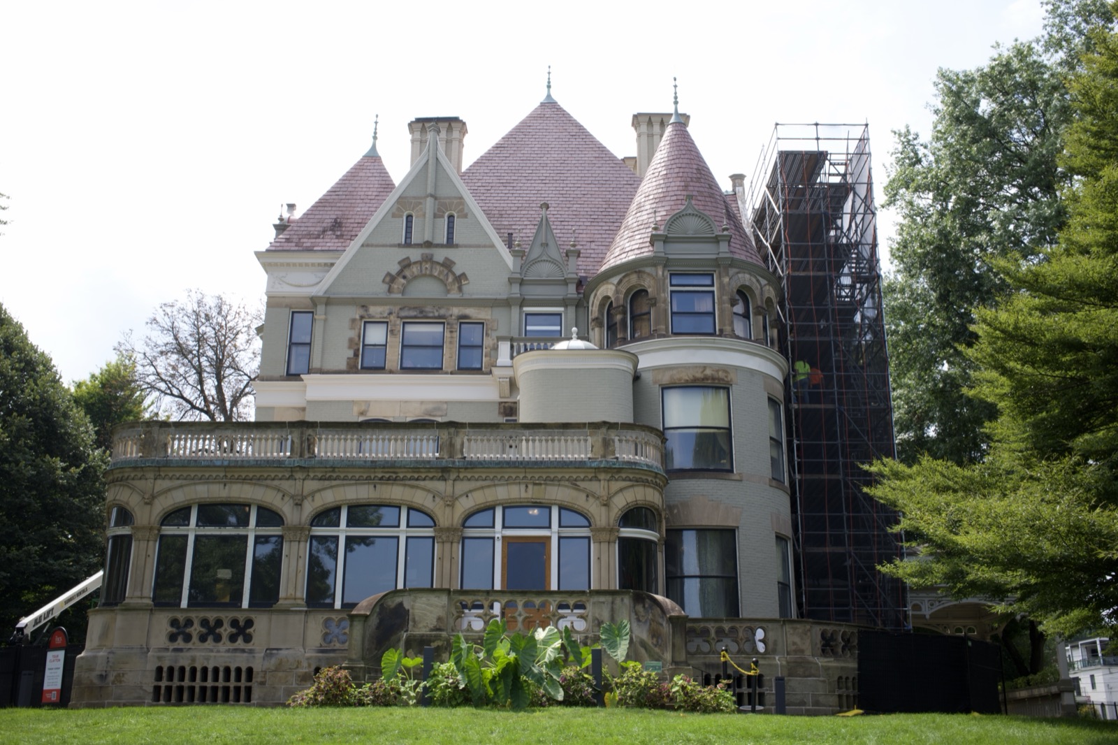 Clayton, the Frick family house in Point Breeze, Pittsburgh, under pipe scaffold with debris netting during exterior restoration by Graciano Corporation