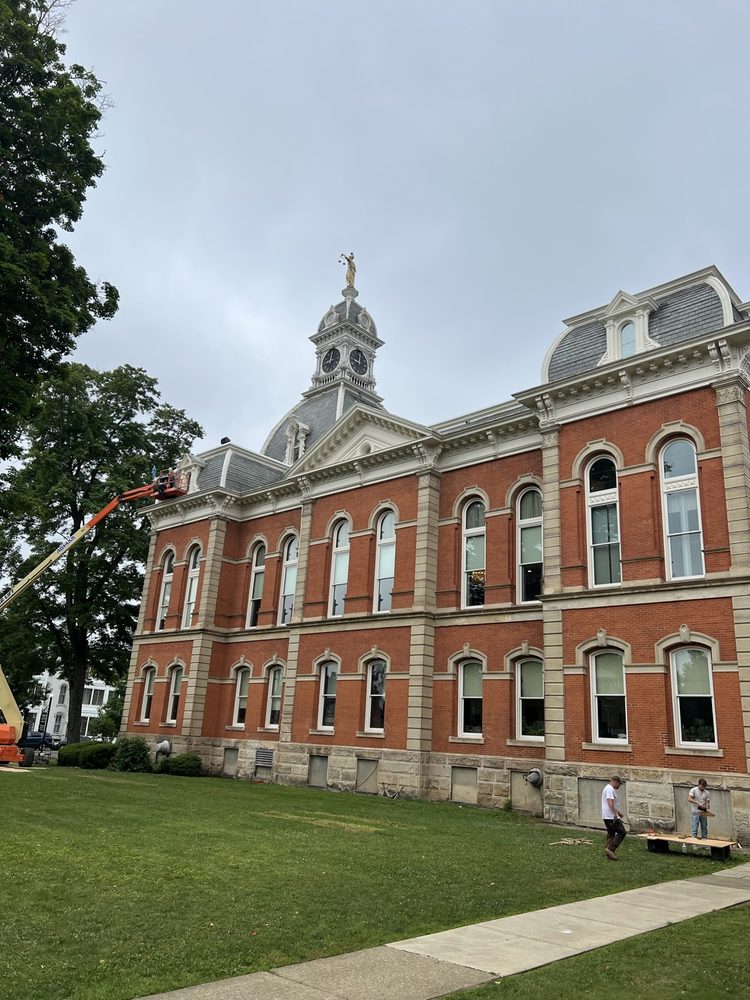 Warren County Courthouse in Warren, PA, with a boom lift at the facade during exterior restoration